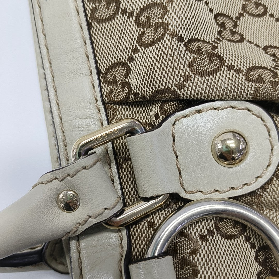 Sukey Monogram Canvas Brown
