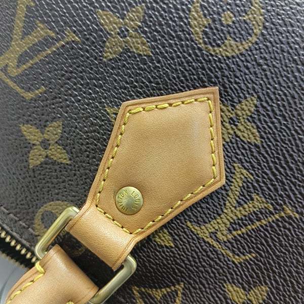 SPEEDY 25 Monogram Coated Canvas Brown