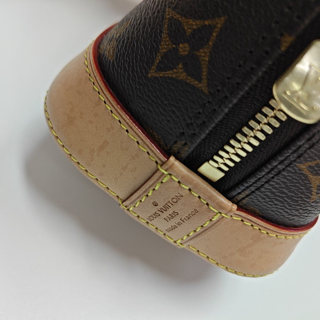 ALMA BB Monogram Coated Canvas Brown
