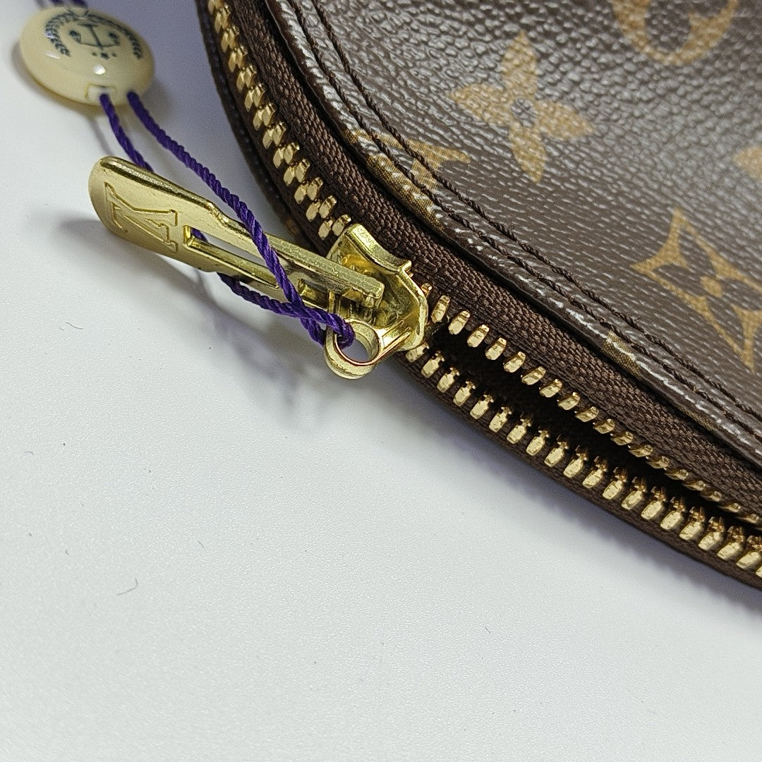 ALMA MM Monogram Coated Canvas Brown