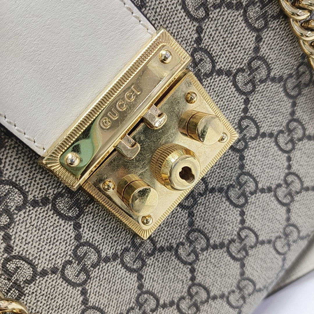 Padlock Small Monogram Coated Canvas Beige