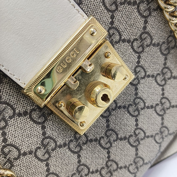 Padlock Small Monogram Coated Canvas Beige