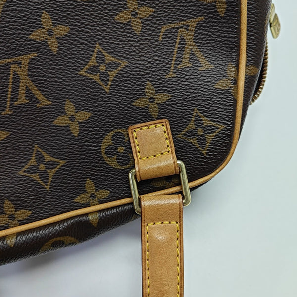 EXCENTRI-CITE Monogram Coated Canvas Brown