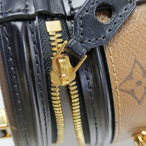 CANNES PM Monogram Coated Canvas Brown