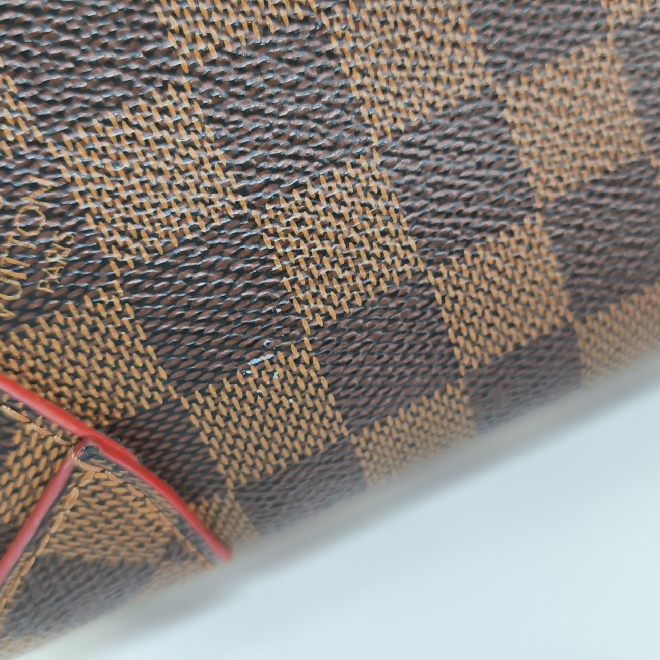 CAÏSSA Damier Ebene Coated Canvas Brown