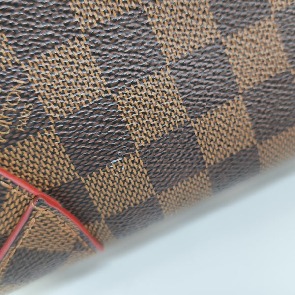 CAÏSSA Damier Ebene Coated Canvas Brown