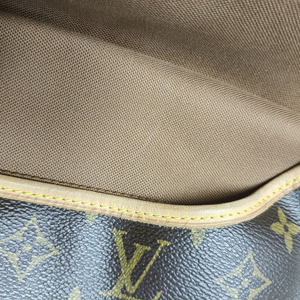 SAUMUR Monogram Coated Canvas Brown