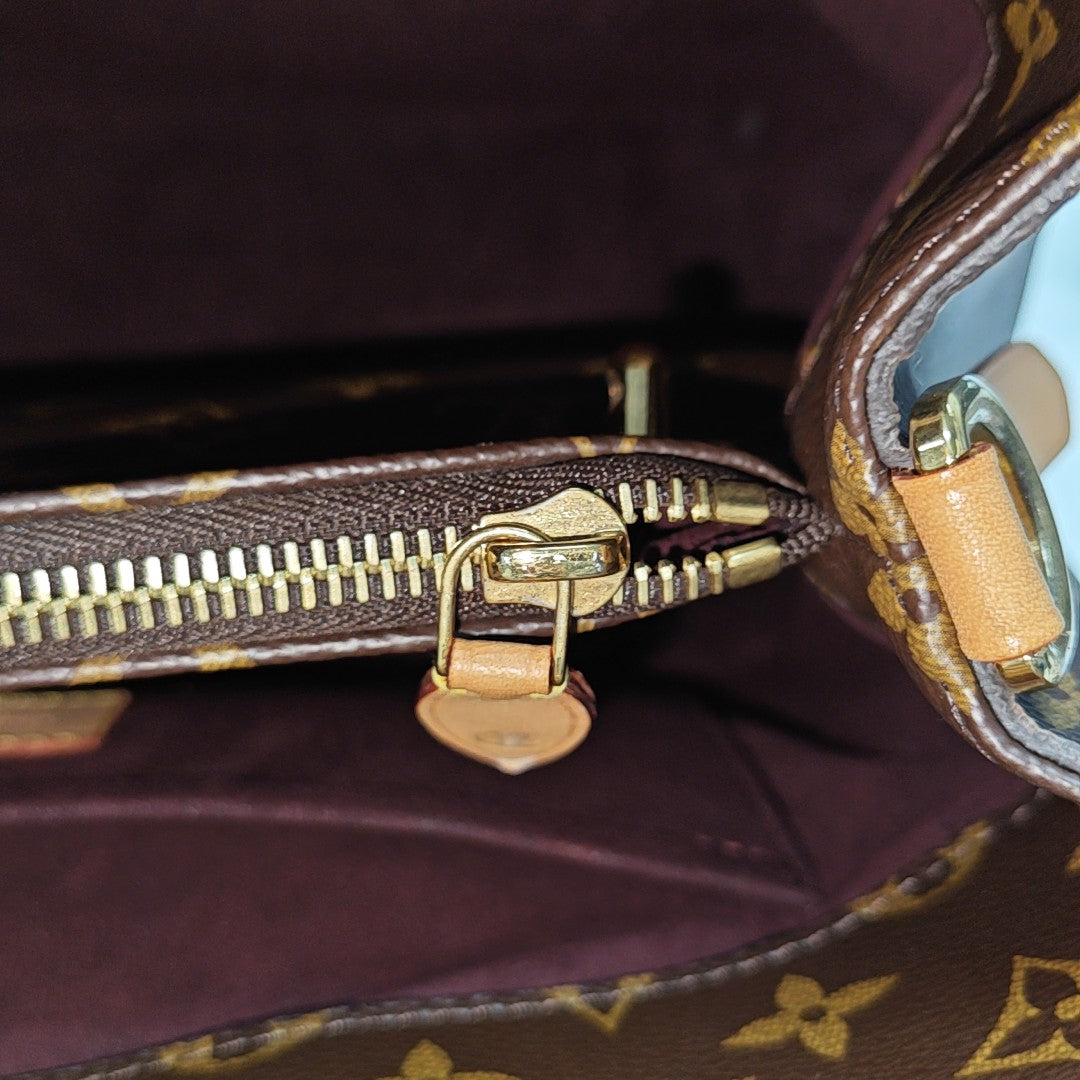 MONTAIGNE GM Monogram Coated Canvas Brown
