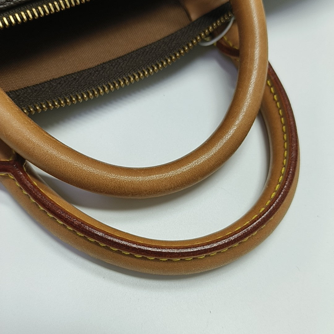 SPEEDY 40 Monogram Coated Canvas Brown