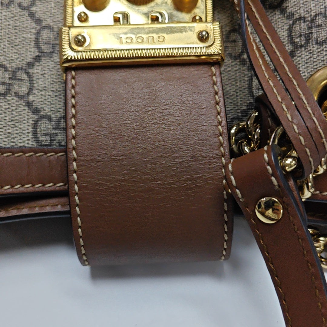 Padlock Small Monogram Coated Canvas Beige