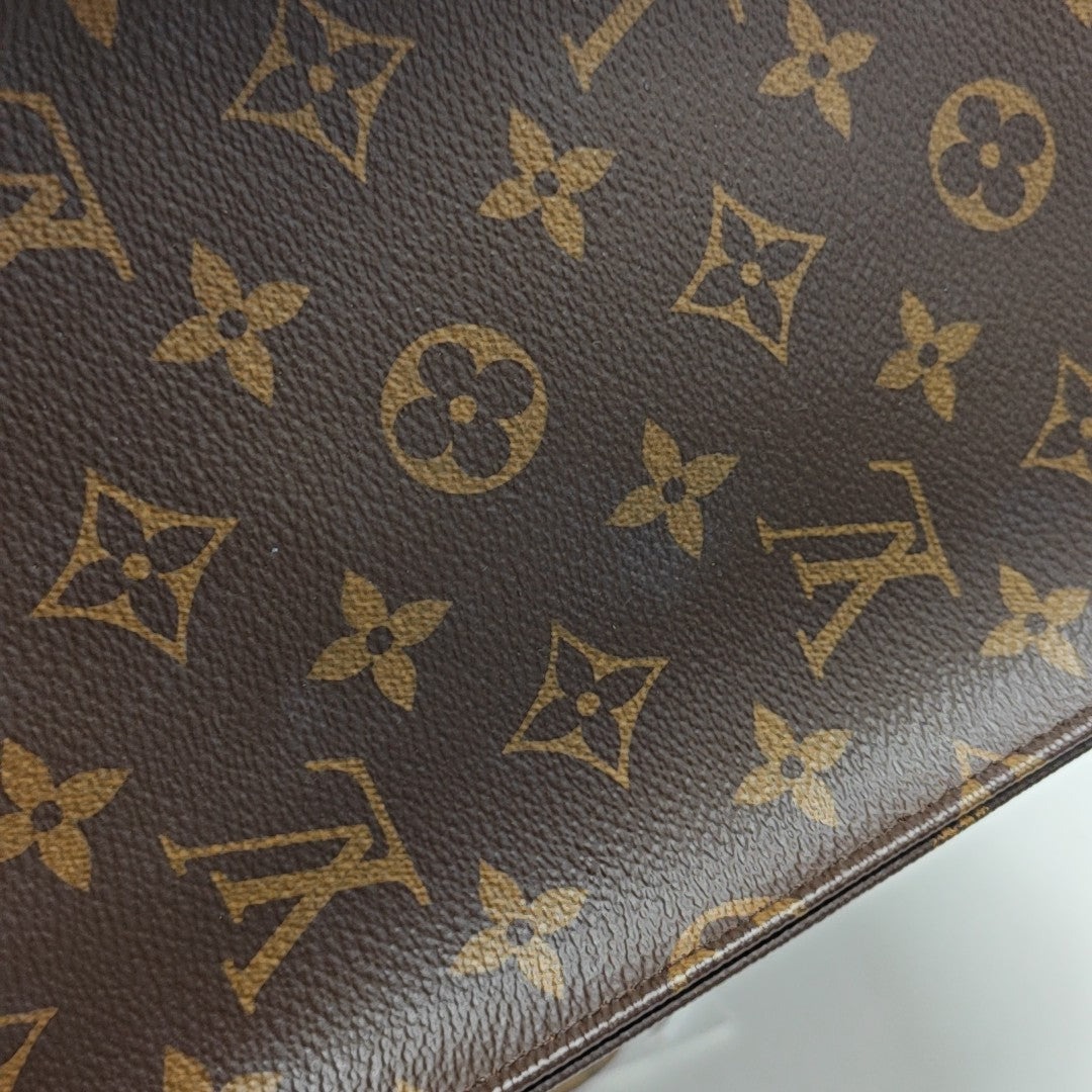 ONTHEGO MM Monogram Coated Canvas Brown