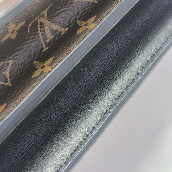 TRUNK Monogram Coated Canvas Brown