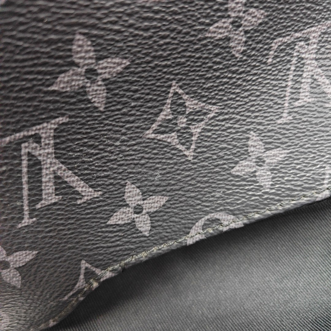 DISTRICT MM Monogram Coated Canvas Black