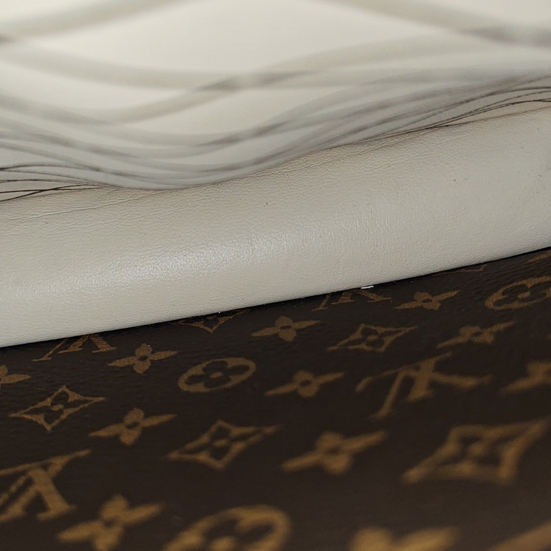 TRUNK Monogram Coated Canvas Brown
