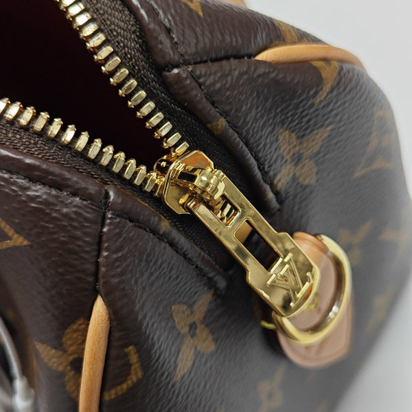 SPEEDY 20 Monogram Coated Canvas Brown