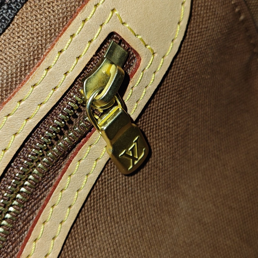 SPEEDY 25 Monogram Coated Canvas Brown