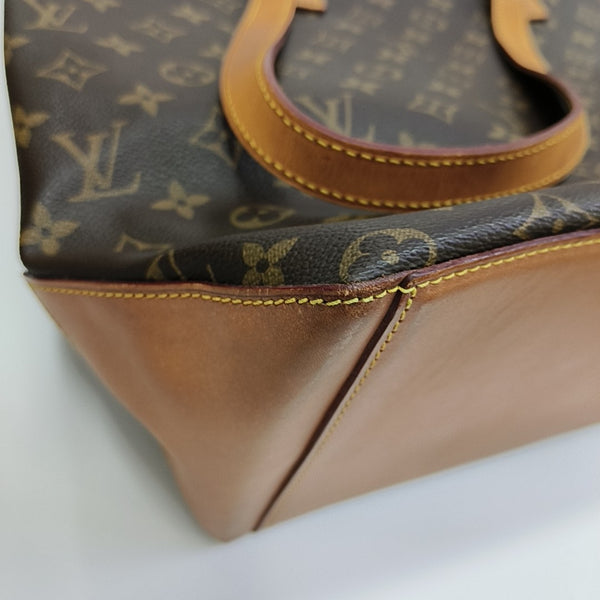 PIANO Monogram Coated Canvas Brown