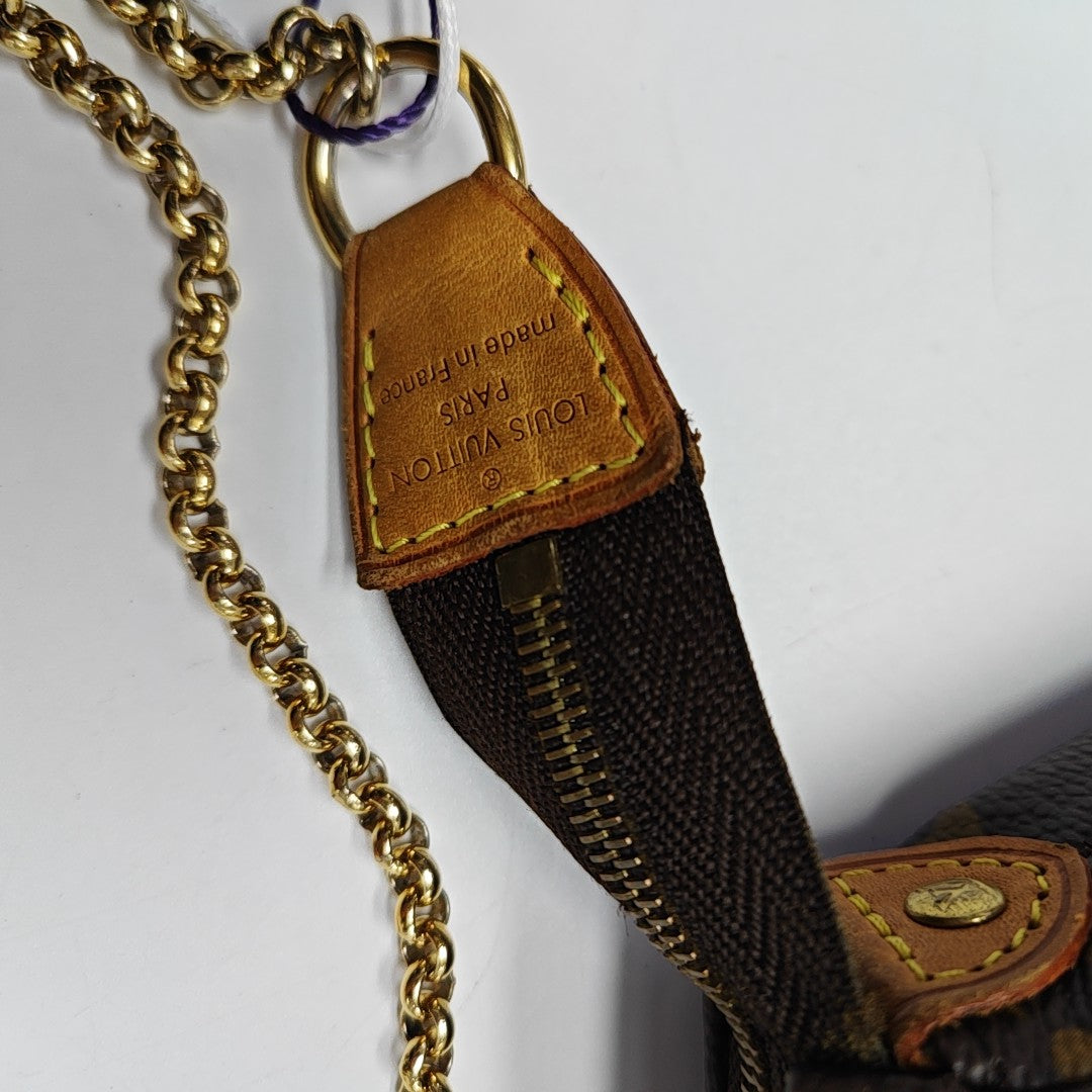 EVA Monogram Coated Canvas Brown