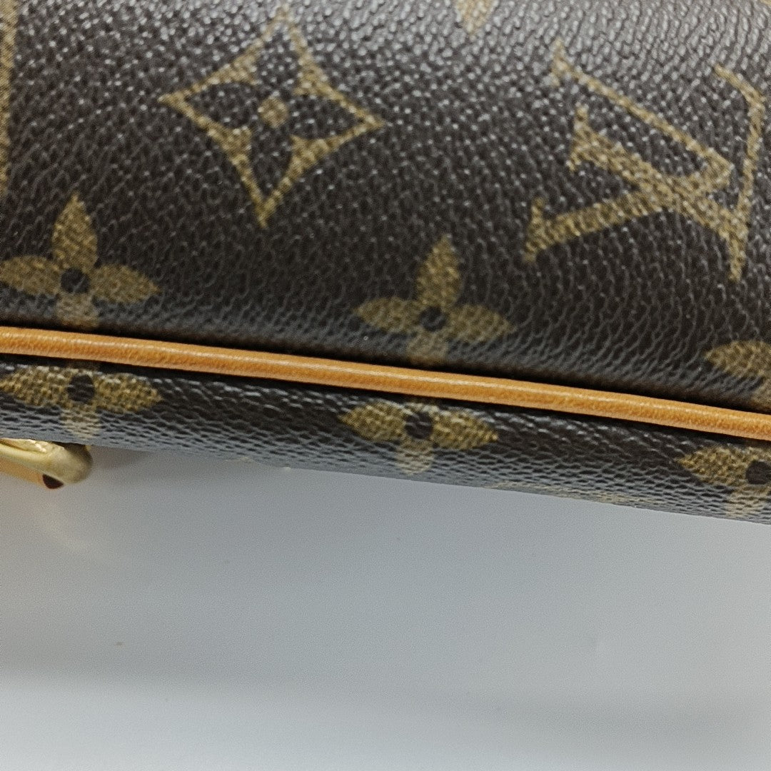 TIKAL Monogram Coated Canvas Brown