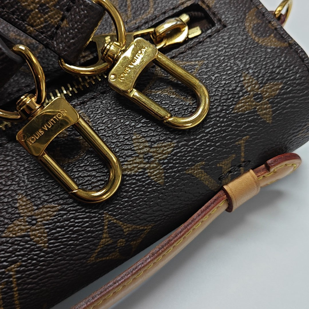 MÉTIS MM Monogram Coated Canvas Brown