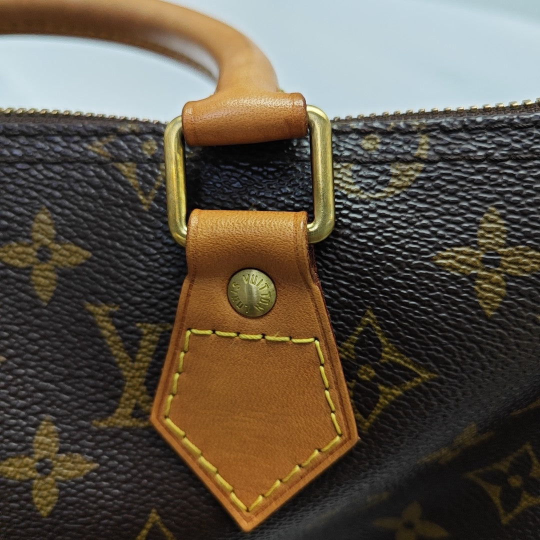 SPEEDY 35 Monogram Coated Canvas Brown
