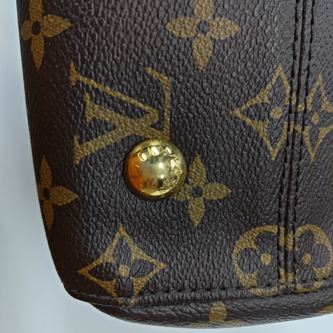 VÉNUS Monogram Coated Canvas Brown