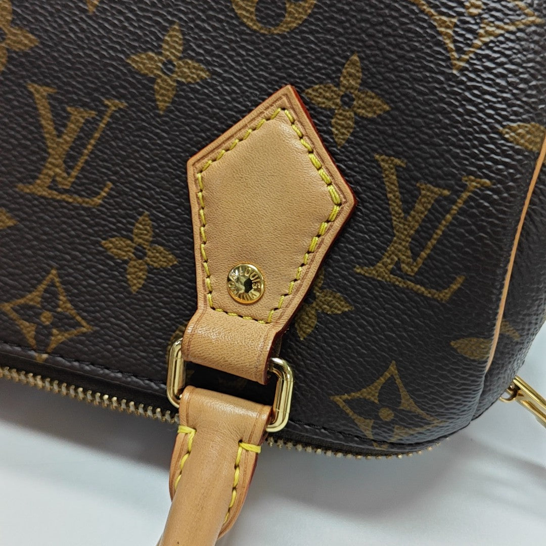 SPEEDY 20 Monogram Coated Canvas Brown