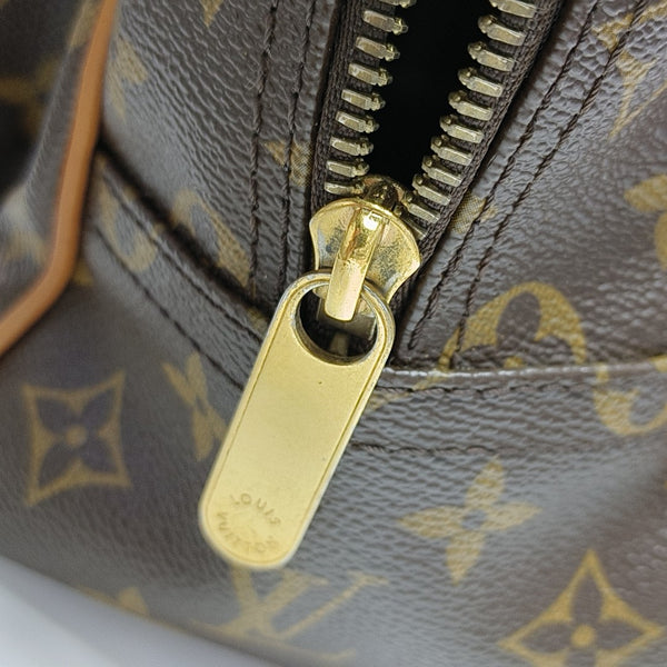 MANHATTAN GM Monogram Coated Canvas Brown