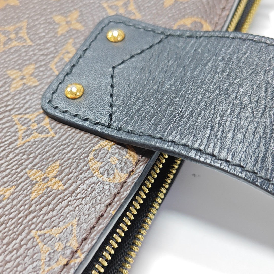 TRUNK Monogram Coated Canvas Brown