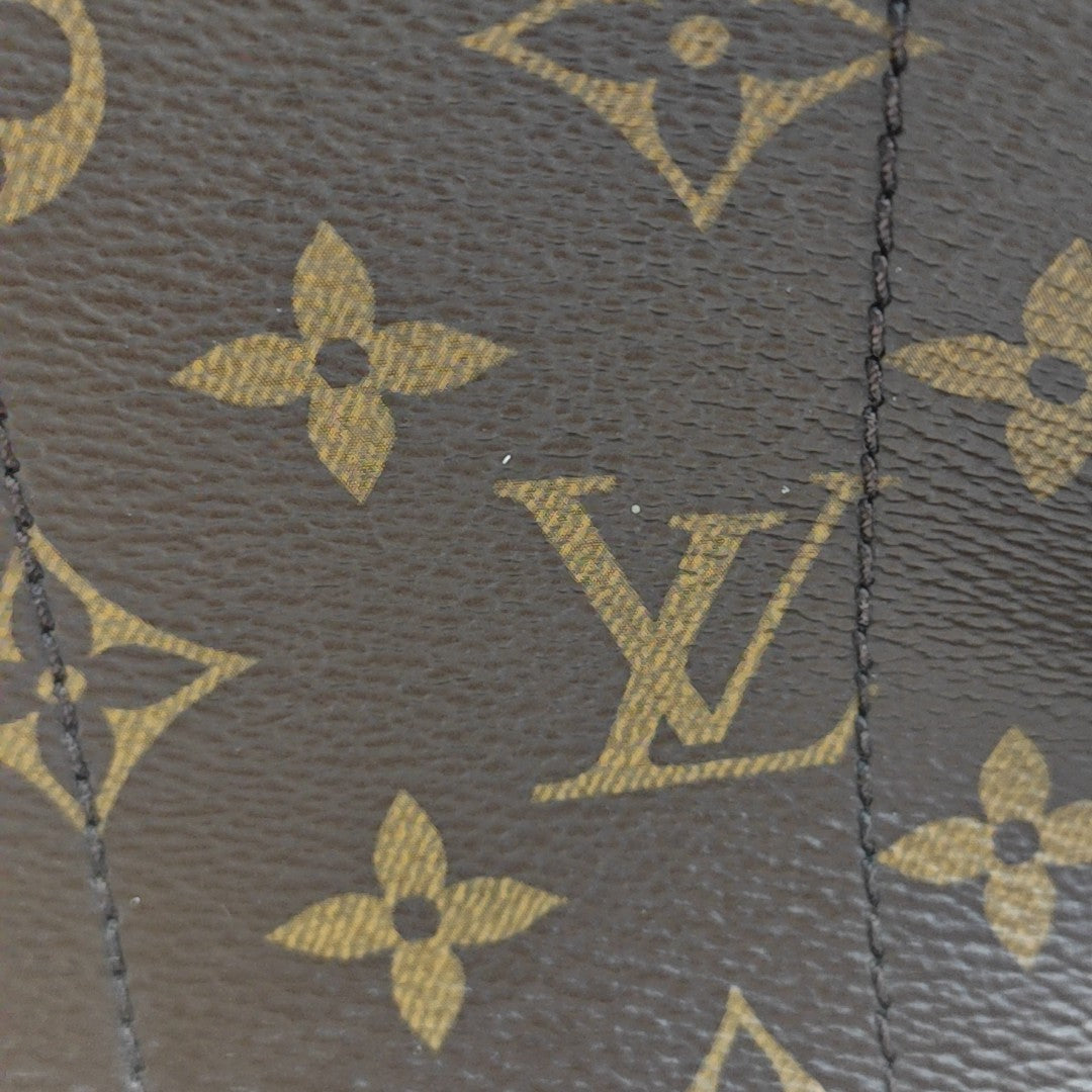 Monogram Coated Canvas Backpack Brown