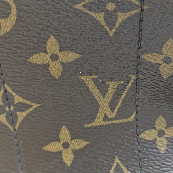 Monogram Coated Canvas Backpack Brown