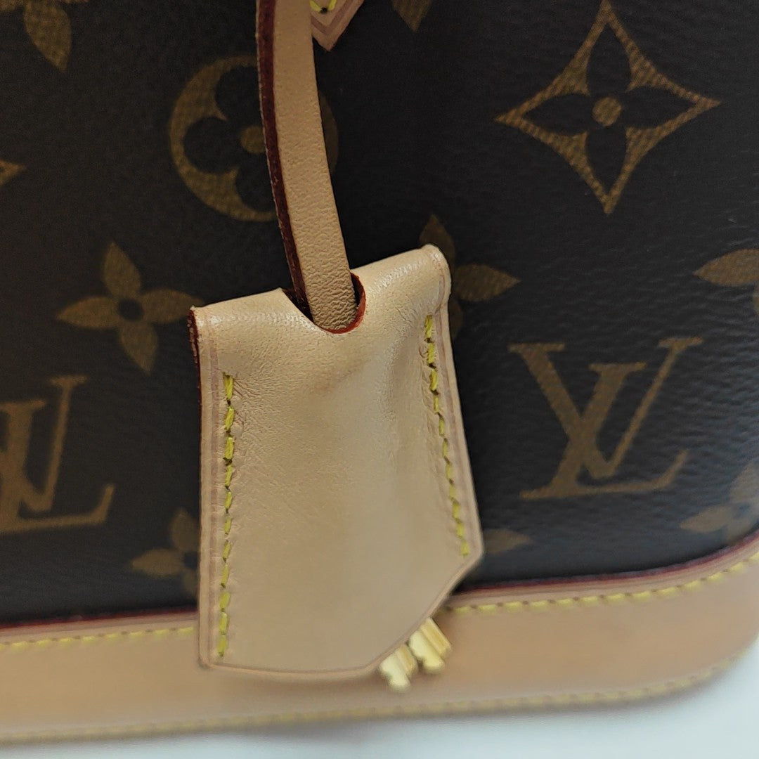 ALMA BB Monogram Coated Canvas Brown