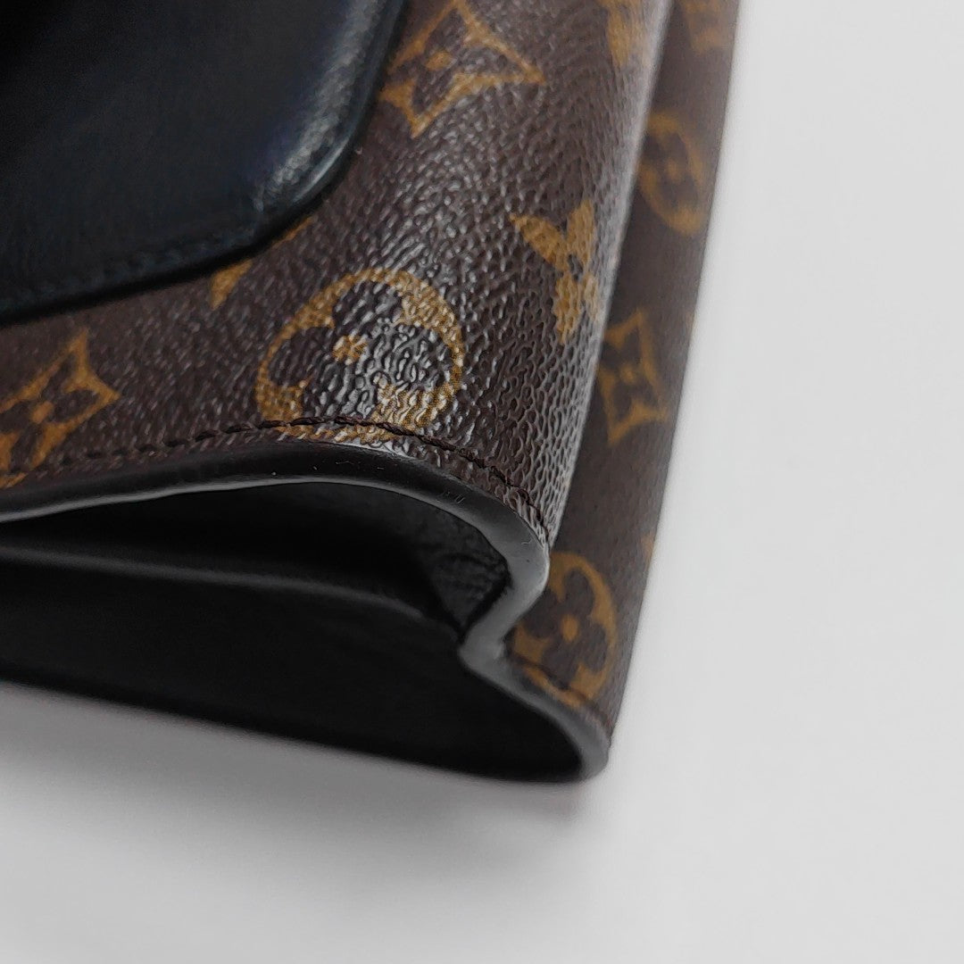 VICTOIRE Monogram Coated Canvas Brown