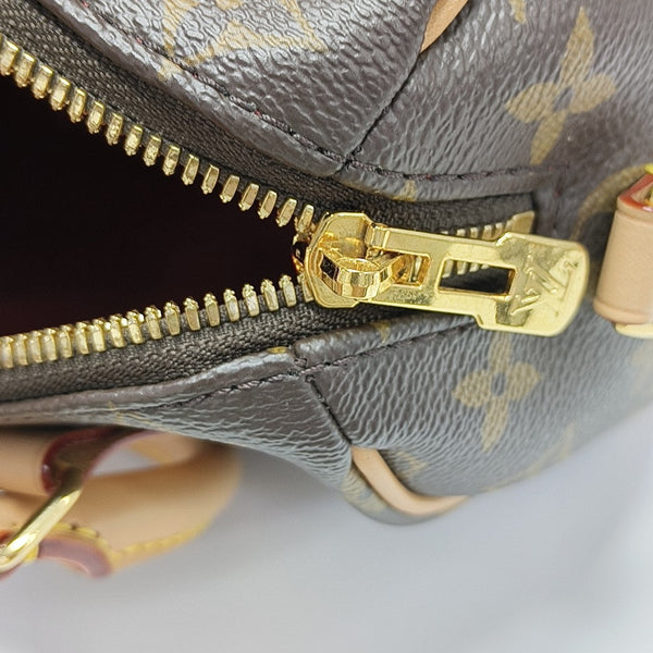 SPEEDY 20 Monogram Coated Canvas Brown