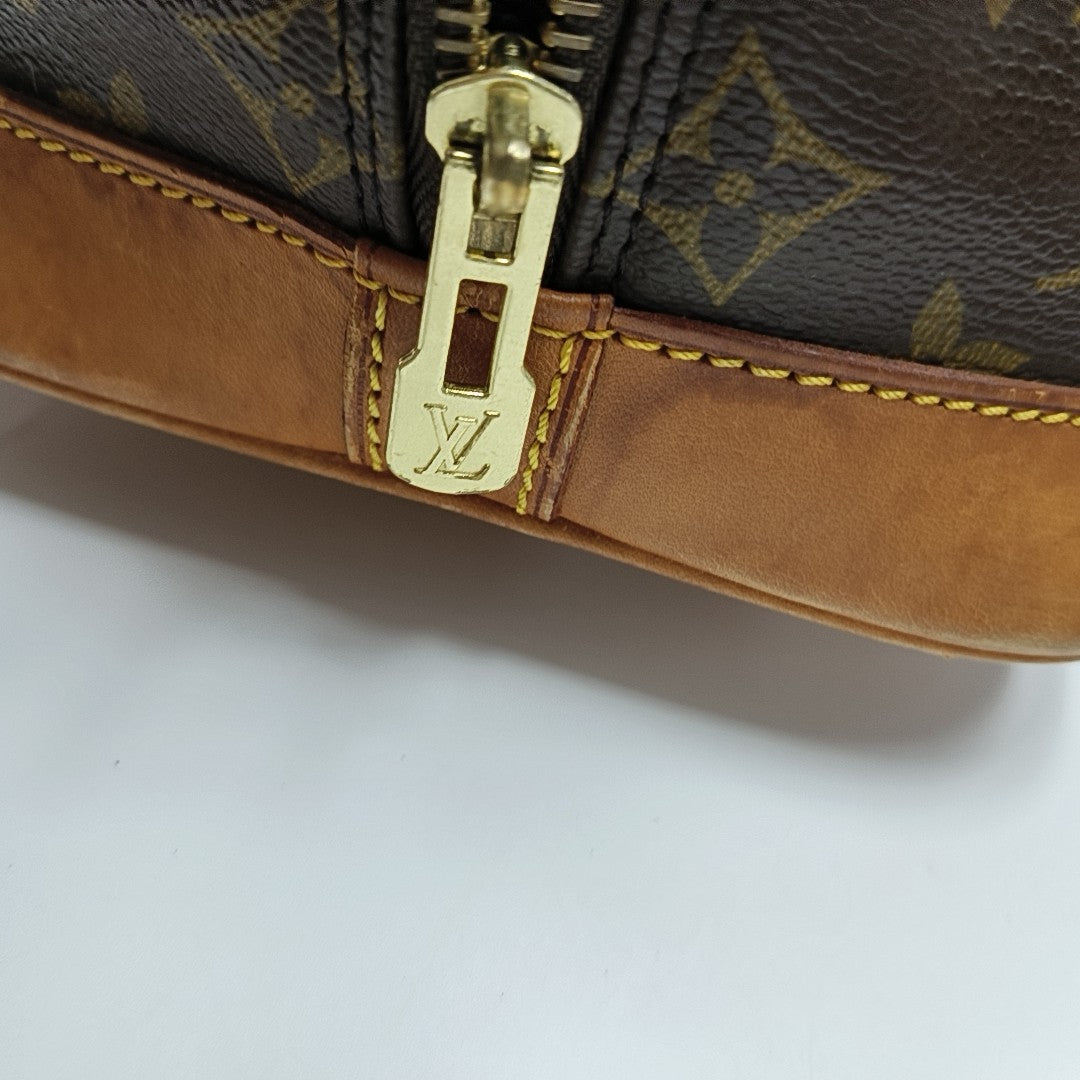 ALMA PM Monogram Coated Canvas Brown