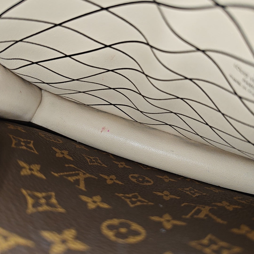 TRUNK Monogram Coated Canvas Brown