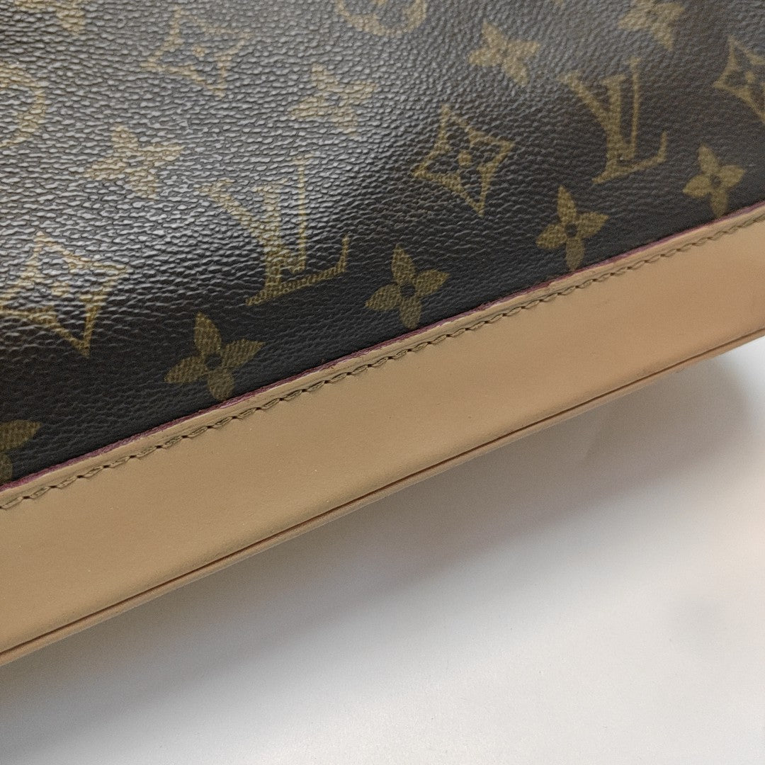 ALMA PM Monogram Coated Canvas Brown