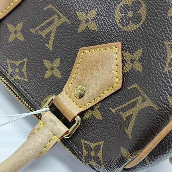 SPEEDY 20 Monogram Coated Canvas Brown