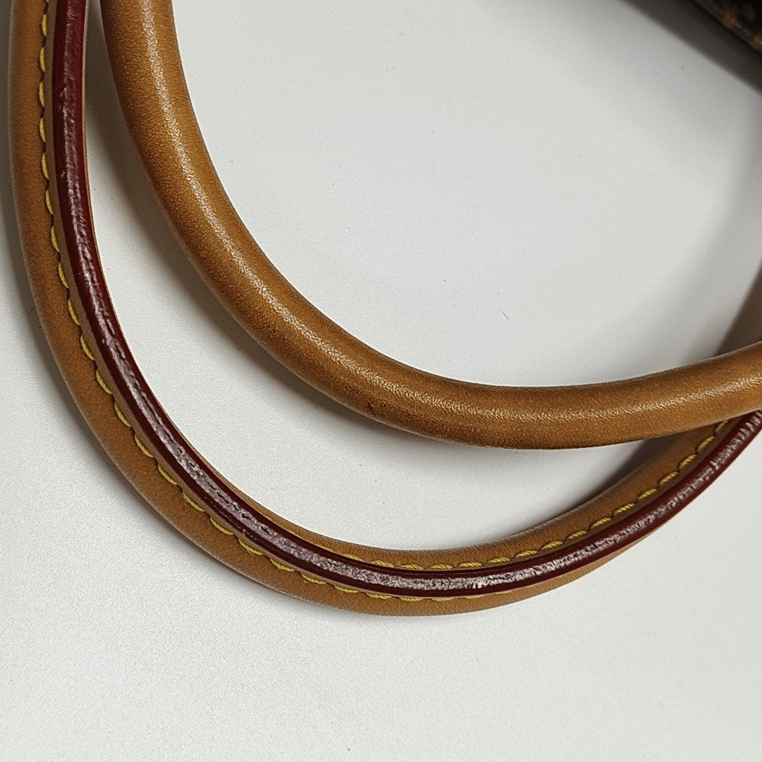 MONTAIGNE GM Monogram Coated Canvas Brown