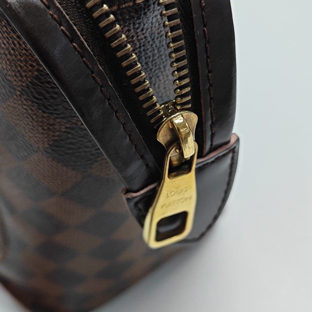 CAÏSSA PM Damier Ebene Coated Canvas Brown