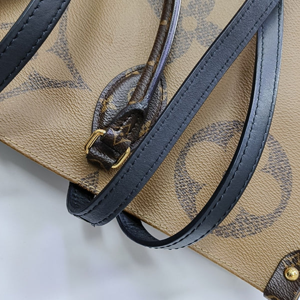 ONTHEGO GM Monogram Coated Canvas Brown