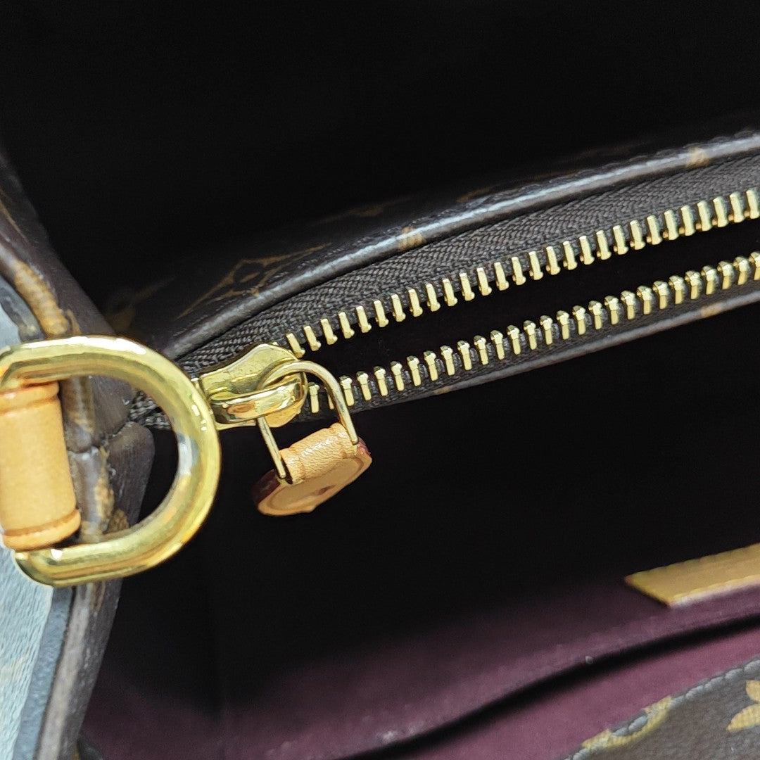MONTAIGNE MM Monogram Coated Canvas Brown