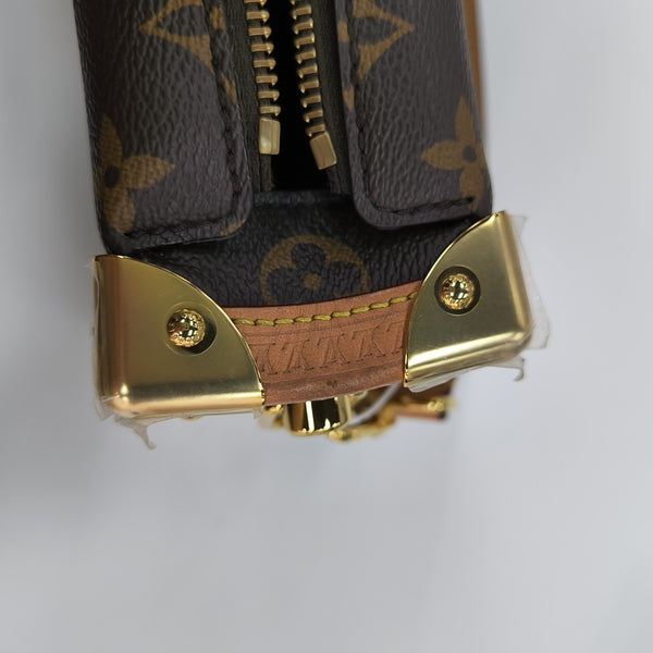 SIDE TRUNK PM Monogram Coated Canvas Brown