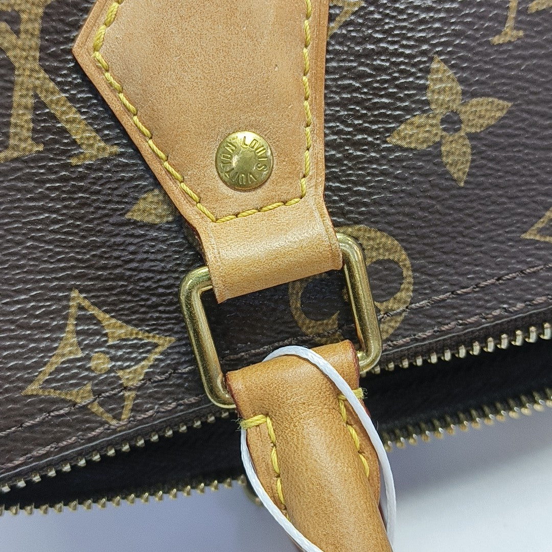 SPEEDY 25 Monogram Coated Canvas Brown