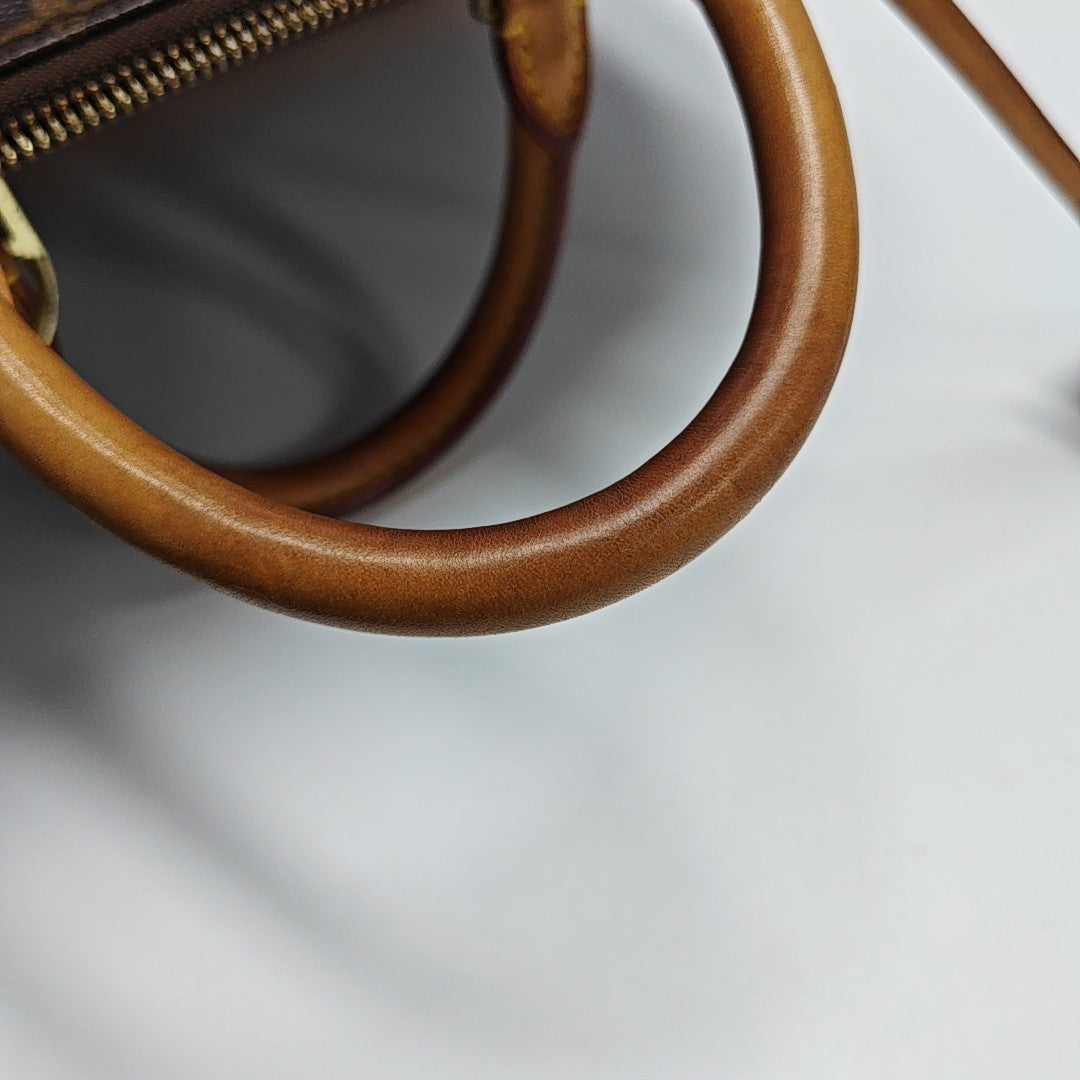 ALMA PM Monogram Coated Canvas Brown