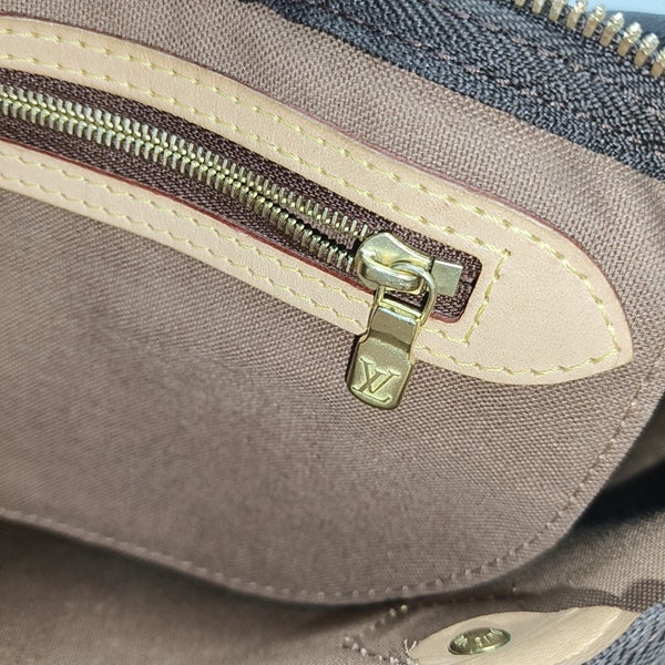 SPEEDY 25 Monogram Coated Canvas Brown