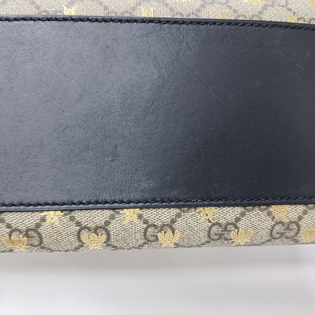 Padlock Medium Monogram Coated Canvas Brown