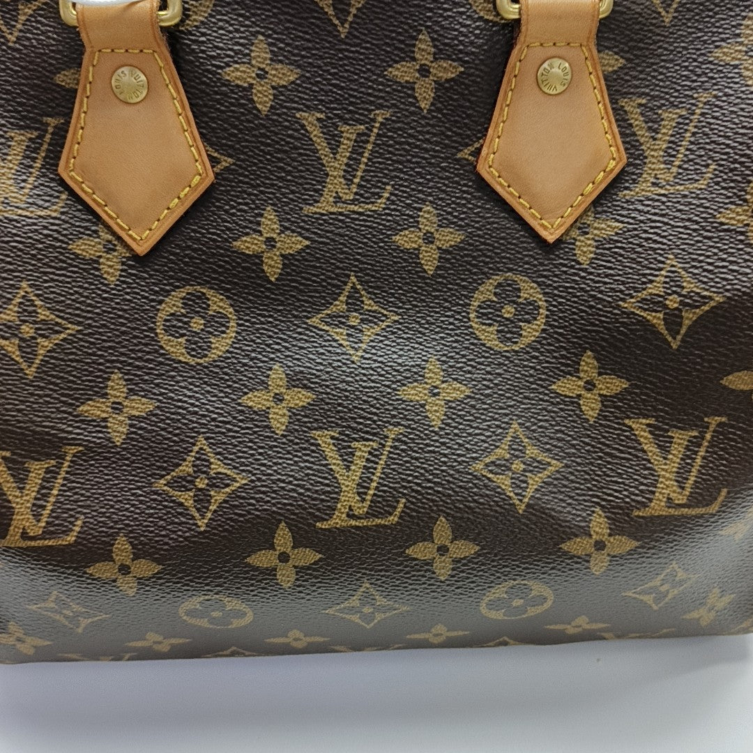 SPEEDY 25 Monogram Coated Canvas Brown