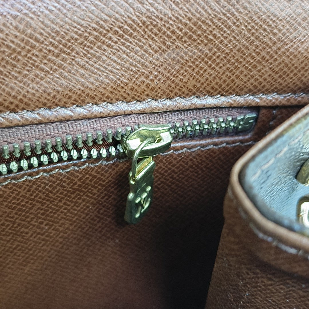 DAME Monogram Coated Canvas Brown