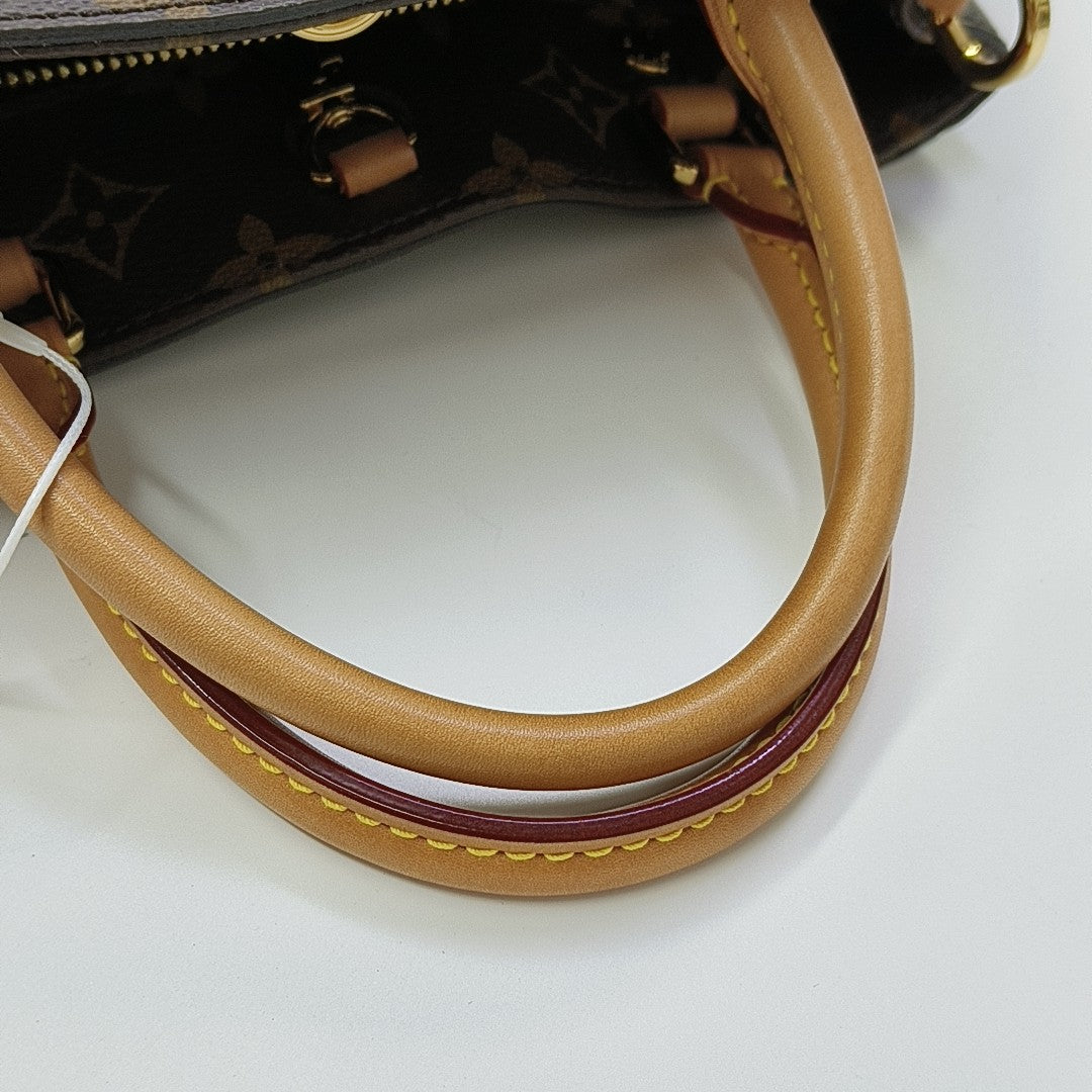 MONTAIGNE Monogram Coated Canvas Brown